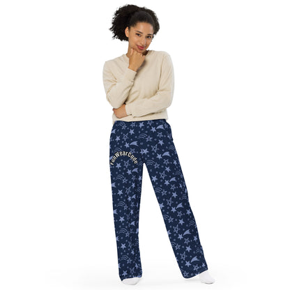 Woman wearing navy blue pajama pants with star pattern with a 'Fun Wear Code' text logo on a white background