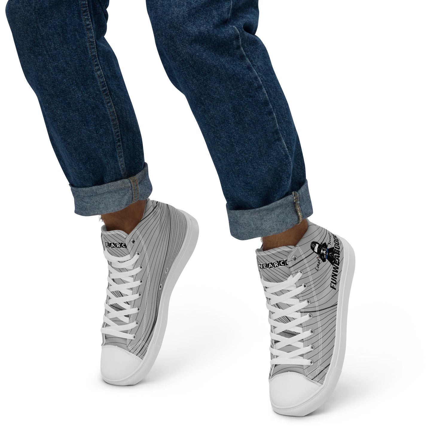 Gray high-top sneakers with a ninja graphic and 'Fun Wear Code' text logo, with white soles worn with blue jeans on a white background