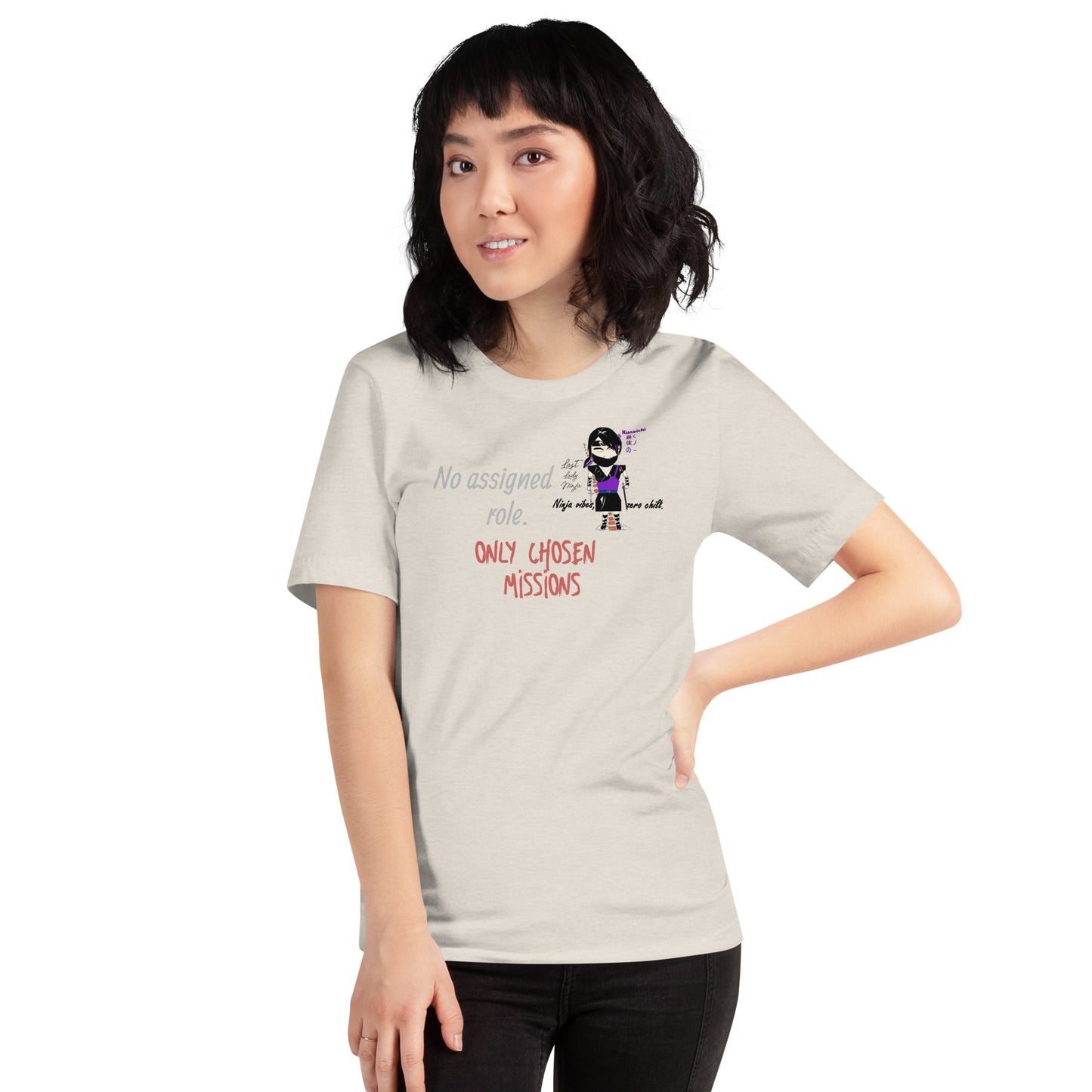 Person wearing a t-shirt with text and a playful lady ninja graphic design on a white background