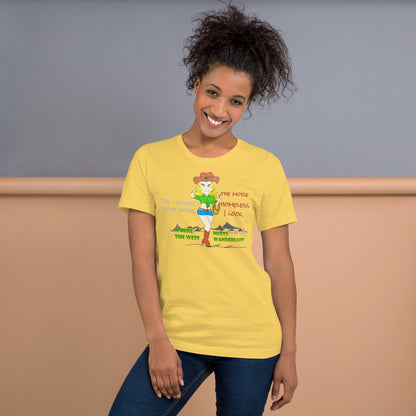 Woman wearing a yellow t-shirt with a cowgirl graphic design on a plain background